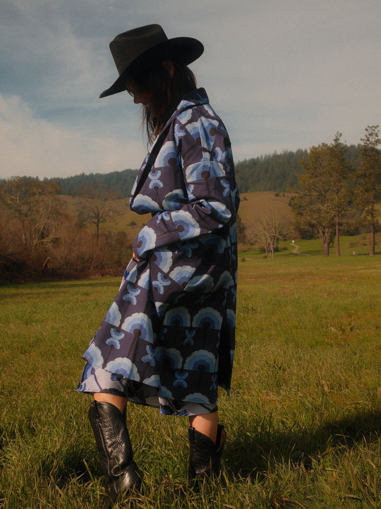 Walking through a meadow, hand in the slash pocket, Midnight Plumes brushed cotton car coat