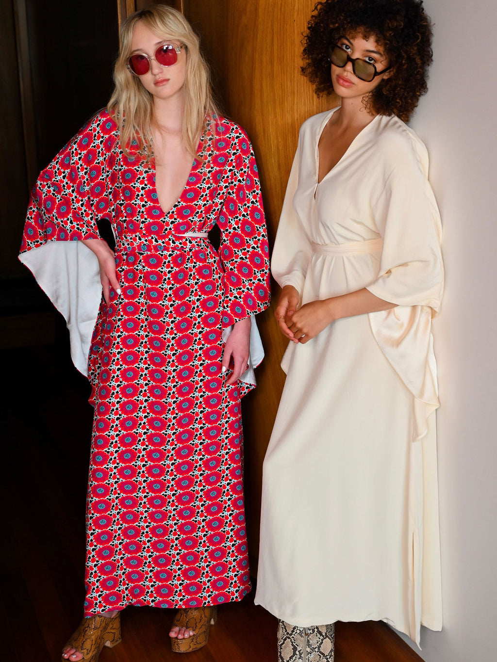 Worn beside a model in a solid ivory kaftan, Magnolia matte viscose kaftan