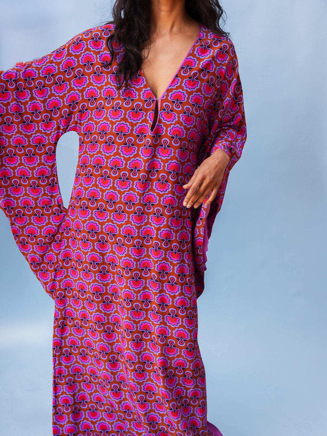 Front view showing the deep V-neck and butterfly sleeves, Dahlia Seed matte viscose kaftan