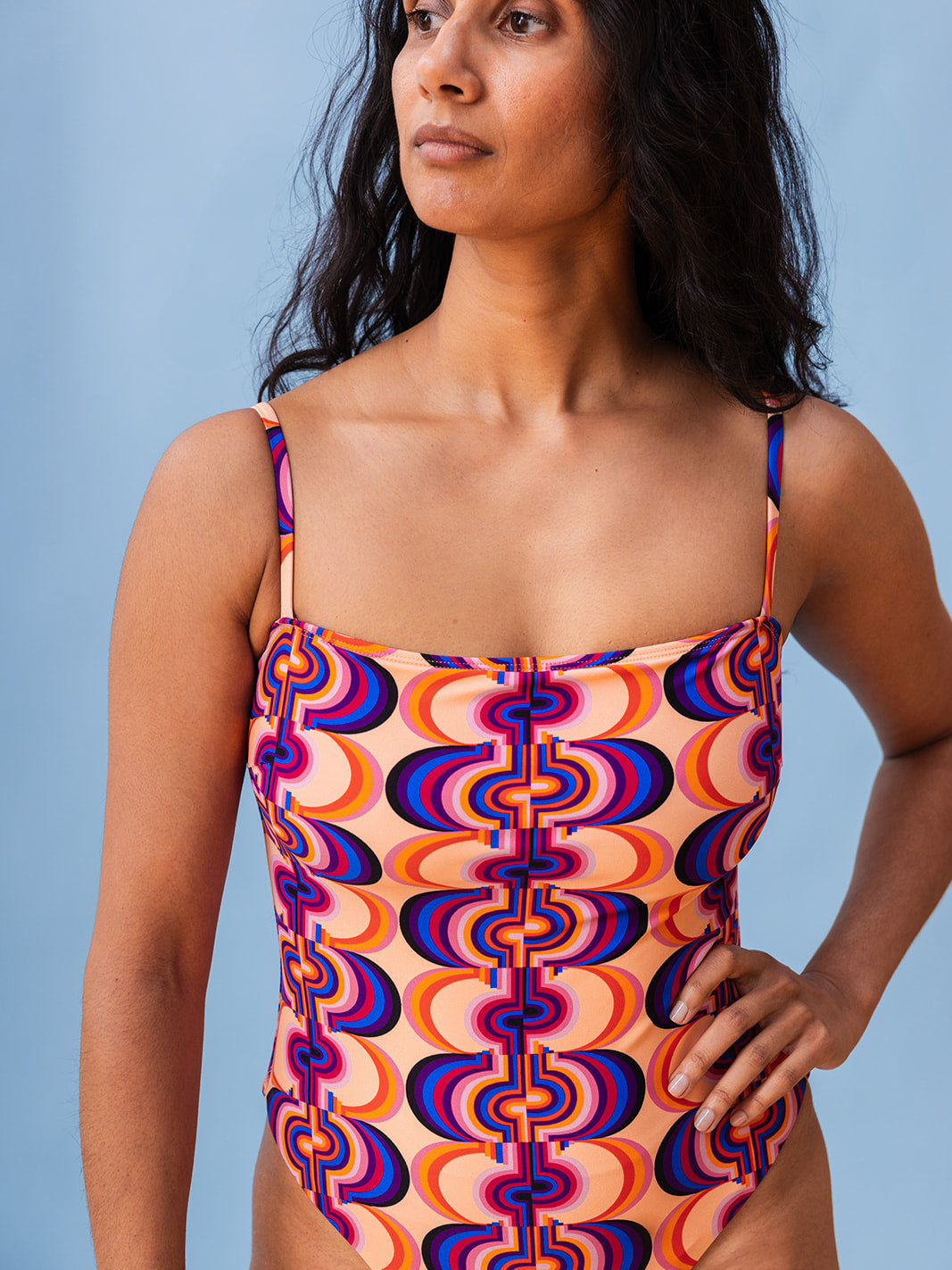 Close-up of the straight neckline and spaghetti straps, Good Vibrations recycled nylon swimsuit