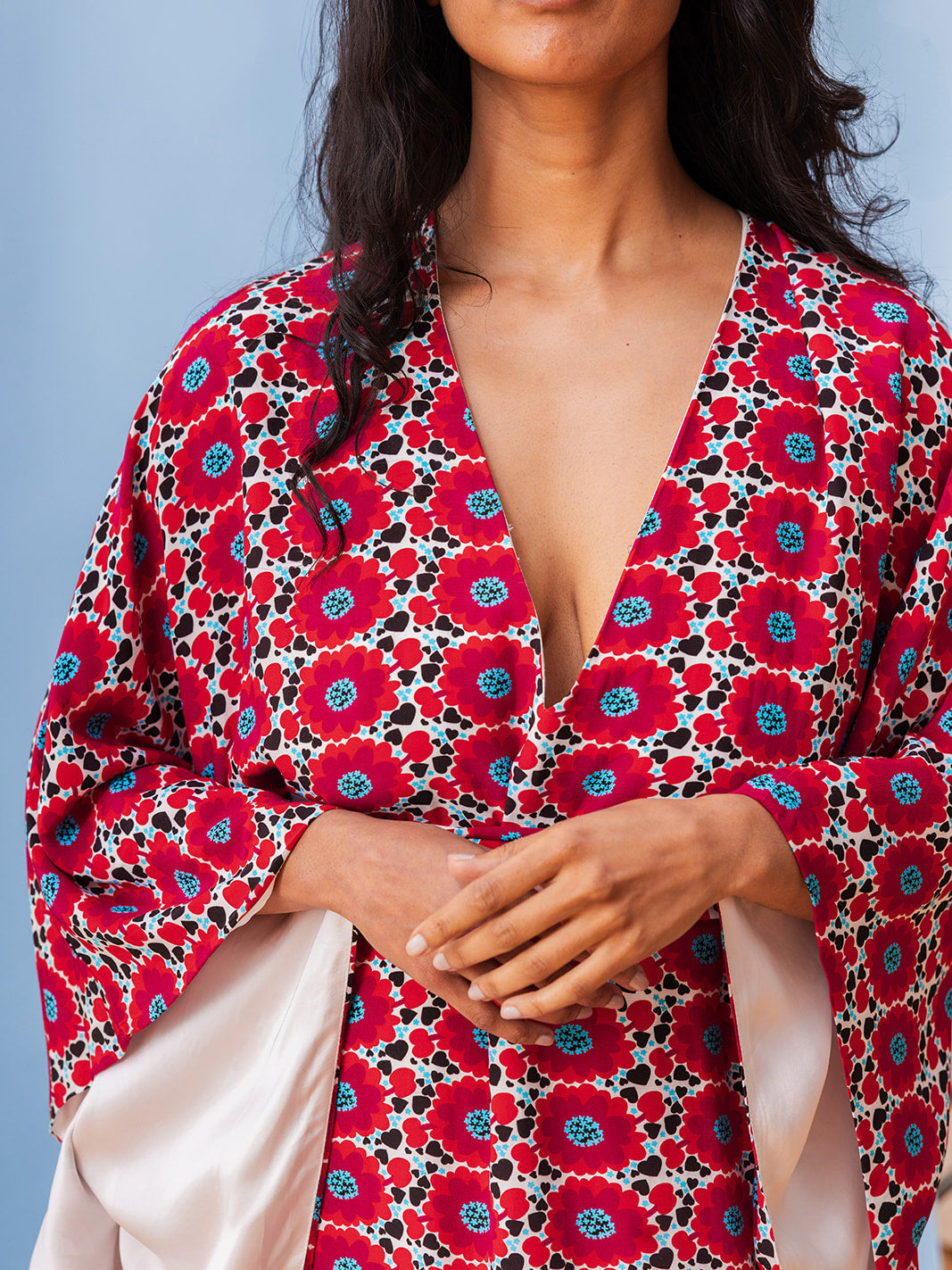 Close-up of the deep V-neck and sleeve lining, Magnolia matte viscose kaftan