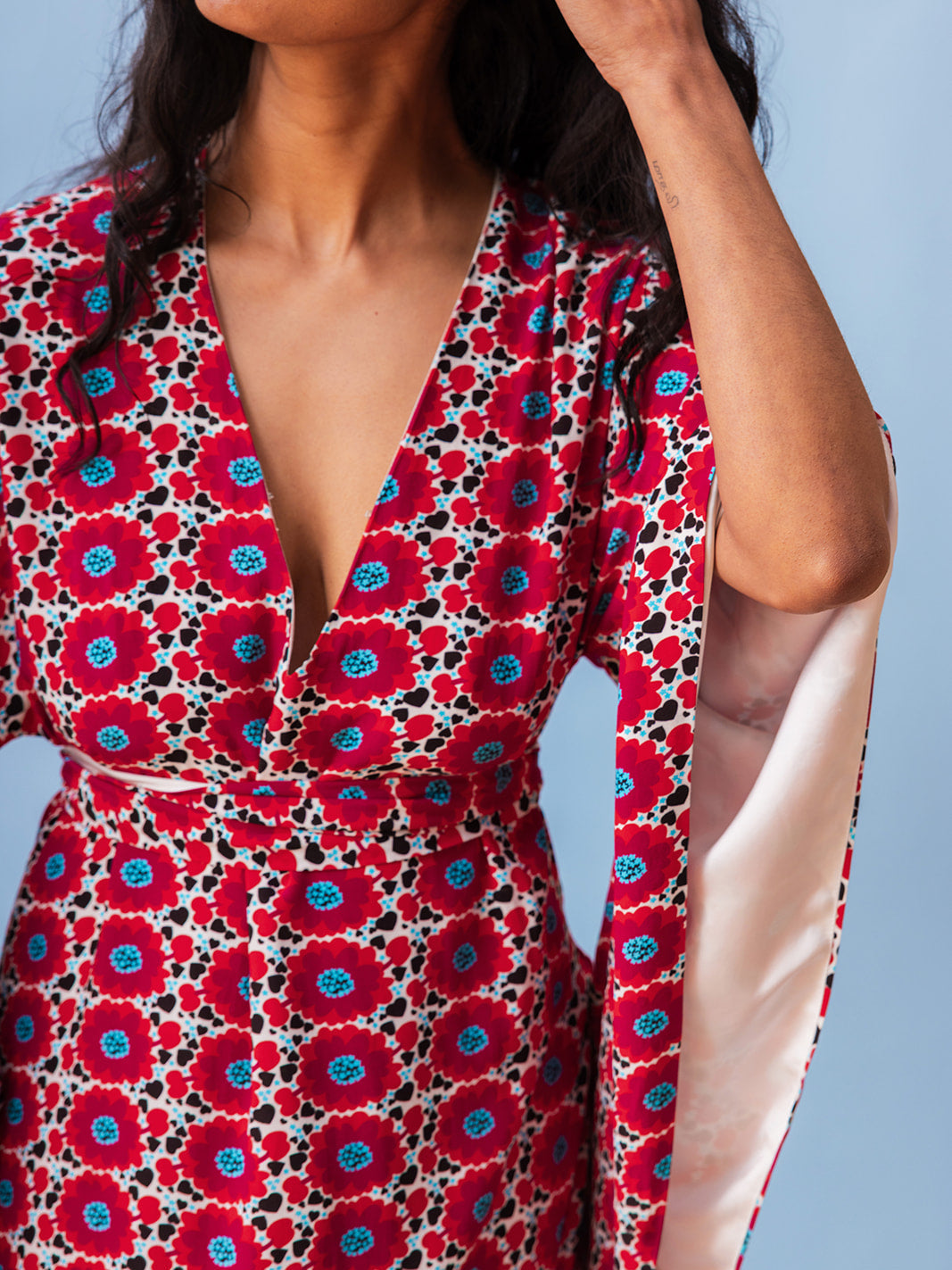 Close-up of the V-neck and waist sash, Magnolia matte viscose kaftan