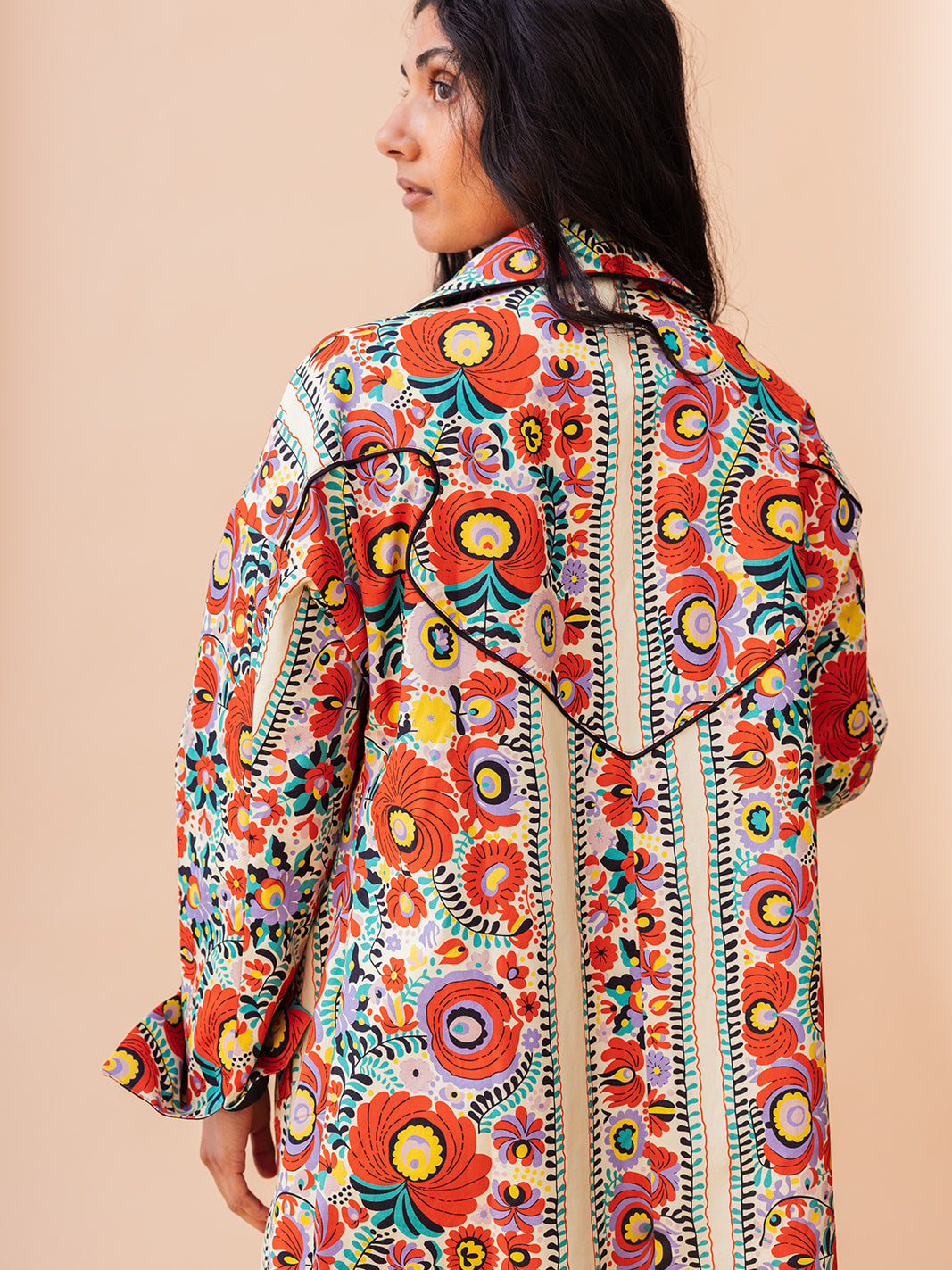 Back view showing the Western-style back yoke, Matyó Floral brushed cotton car coat