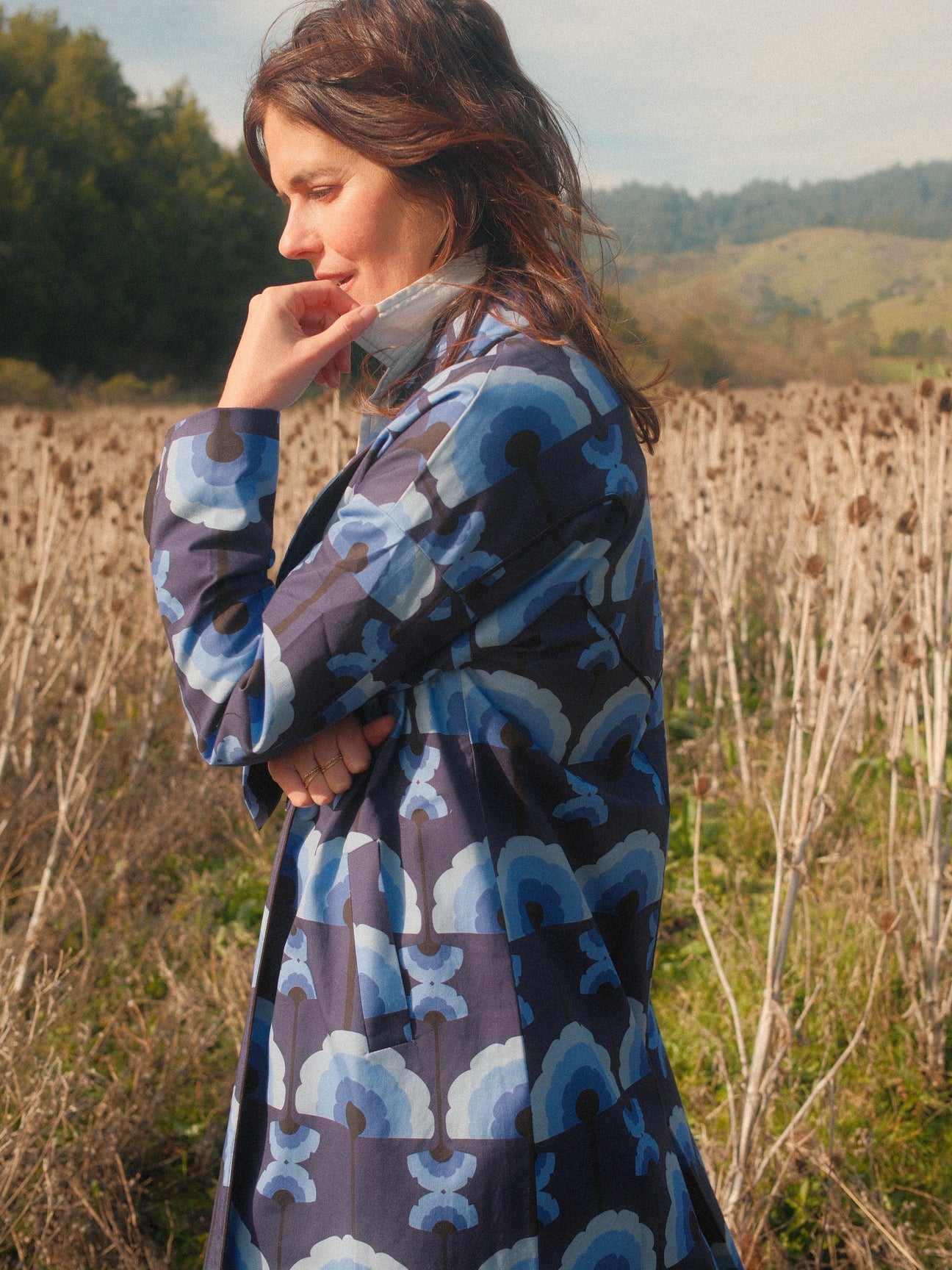 Side view in a field of teasels, Midnight Plumes brushed cotton car coat